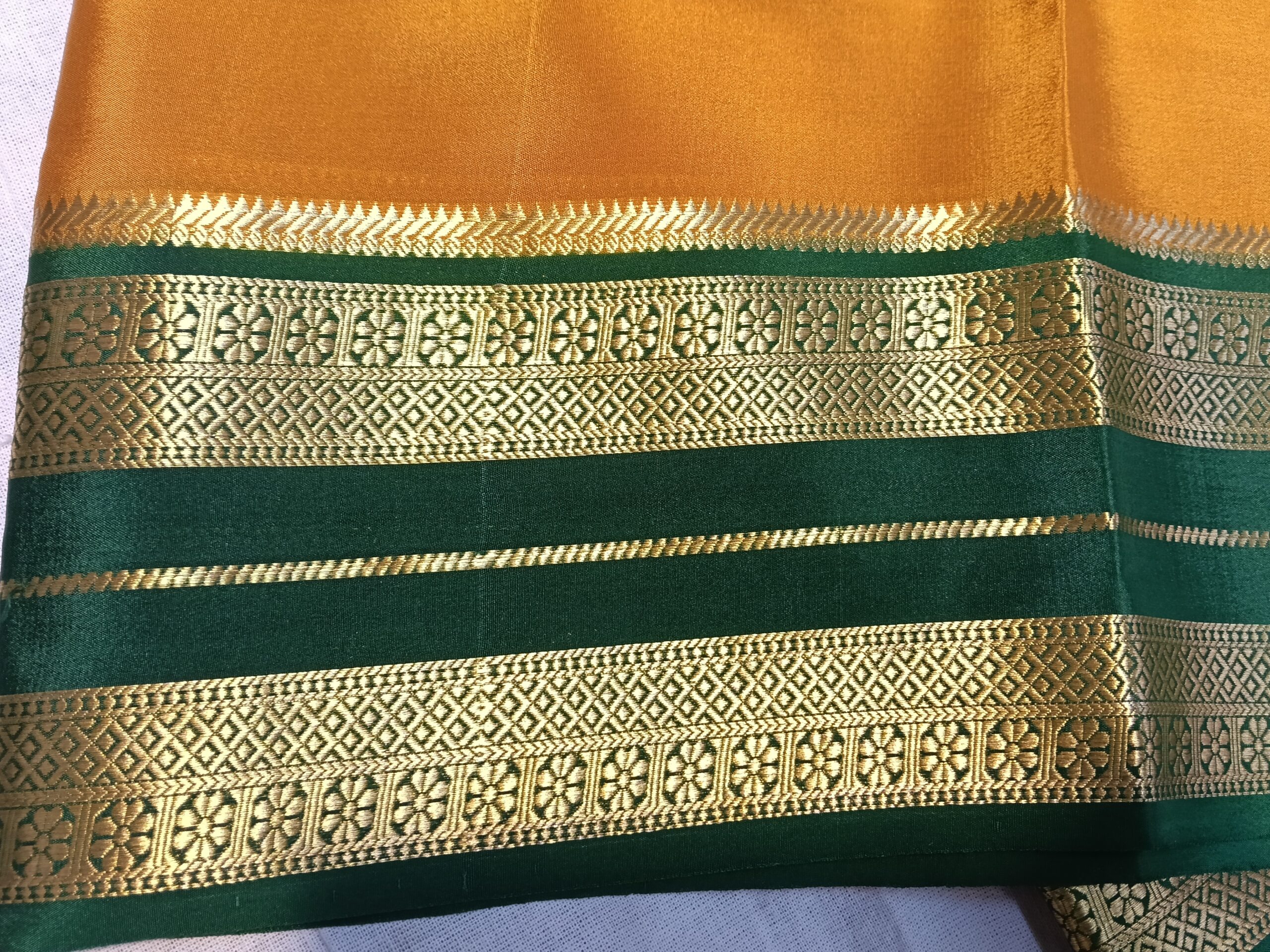 Orange Mysore Crepe Silk Saree with Green Border & Gold Floral Prints - Image 6