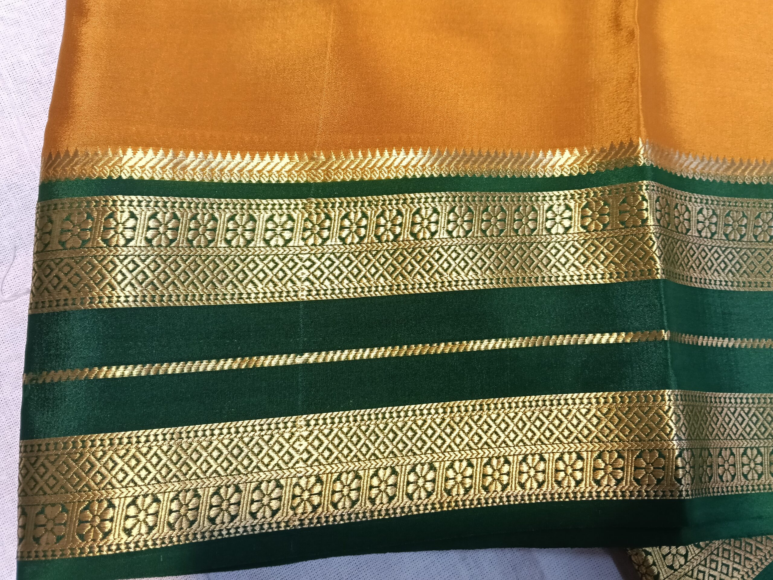 Orange Mysore Crepe Silk Saree with Green Border & Gold Floral Prints - Image 4